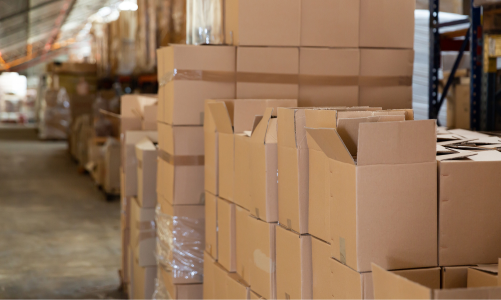 boxes of marketing material in a fulfillment center